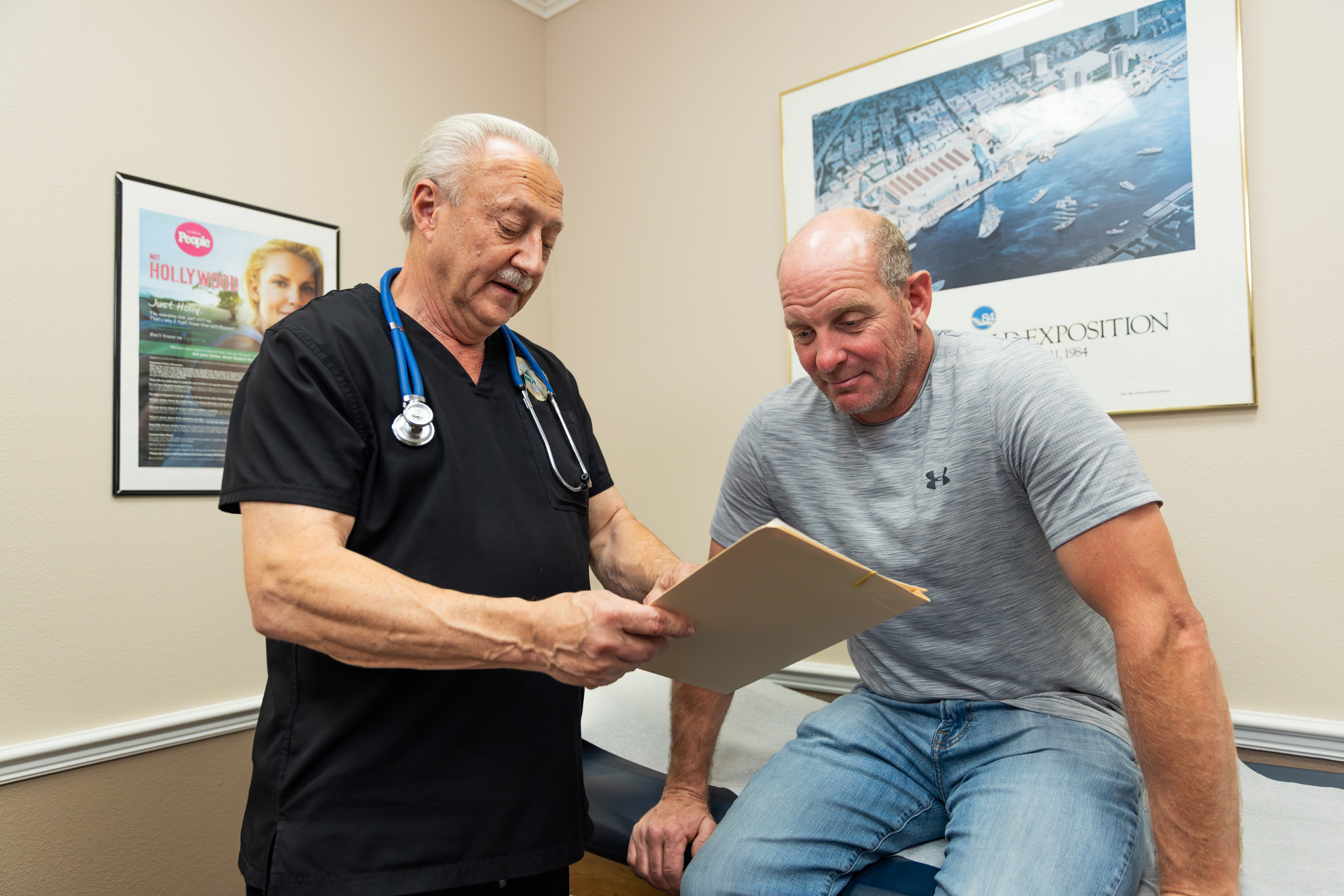 A man and a provider discuss bone density scan in Ocala
