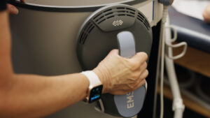 A close-up of a provider preparing the Emsculpt NEO for body contouring in Ocala